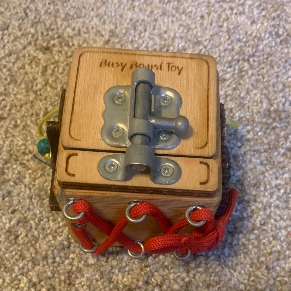 Wooden Busy Board Toy with Red Laces
